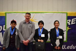 Mike Morris with the winners of the Topcoder award at the Young Inventors Program